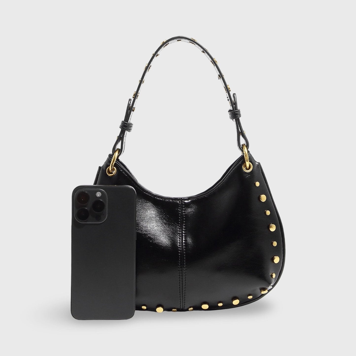 Claudia Tasche mit Golddetails